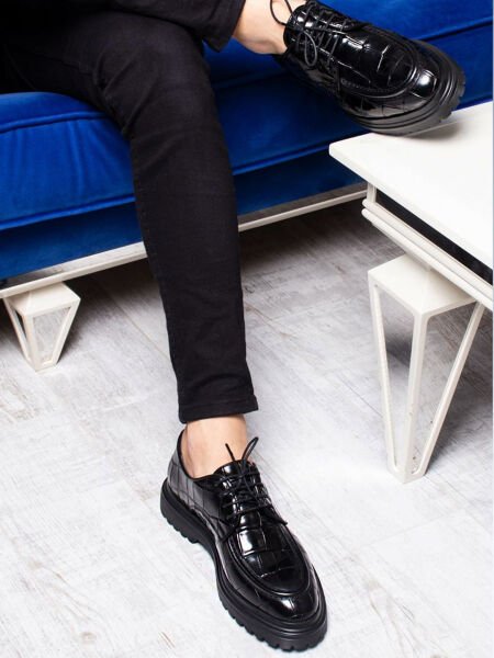 SCHWARZER KROKO-LÖWE